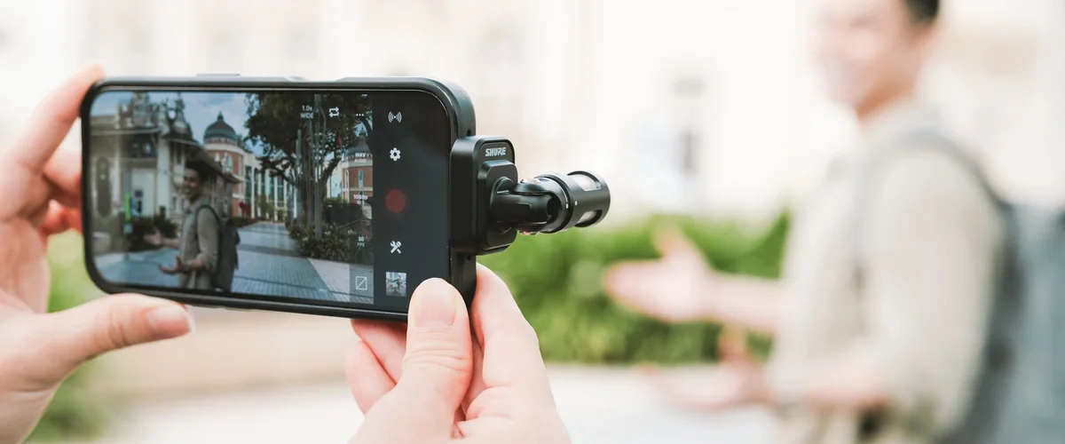 Shure MV88 USB-C microphone connected to a phone